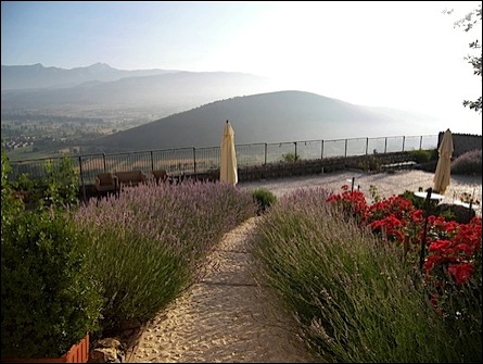 small castle hotels in Italy: Fortress Monastery Santo Spirito outdoor terrace with view of gran sasso d'Italia